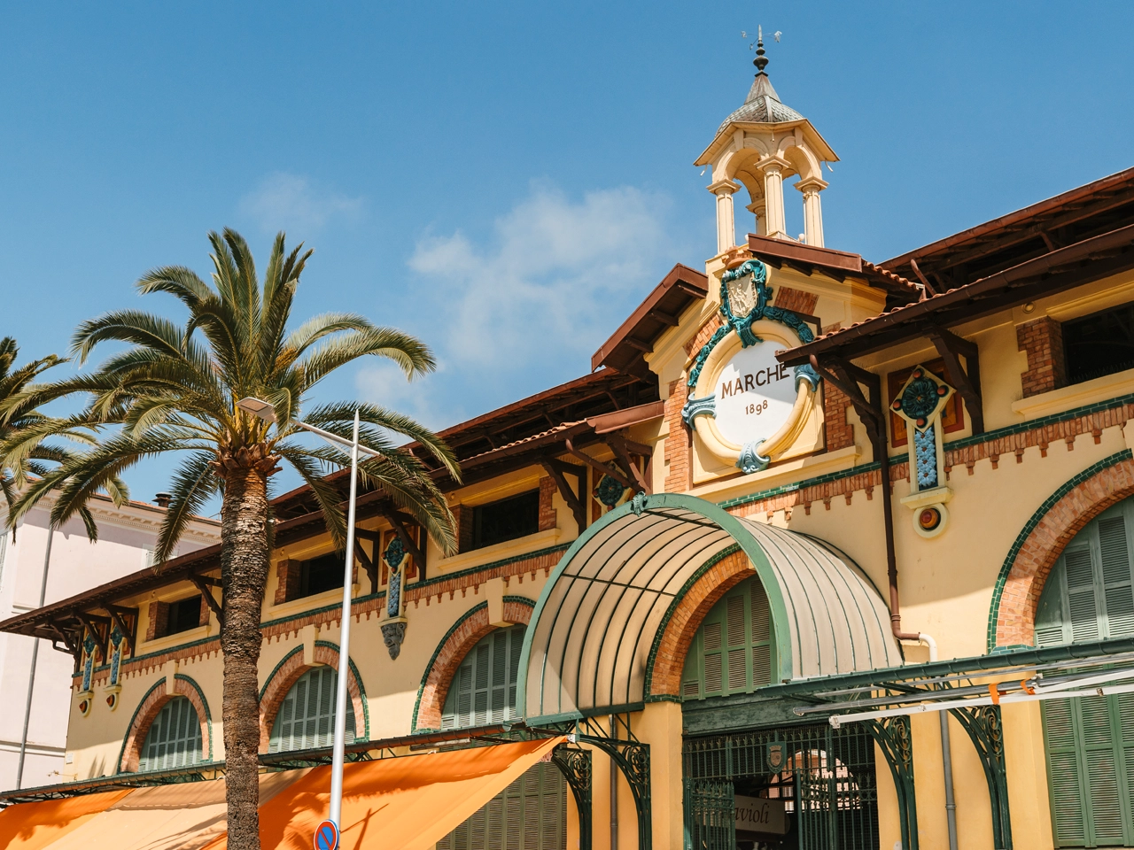 The Belle Epoque entrance to Les Halles covered market in Menton